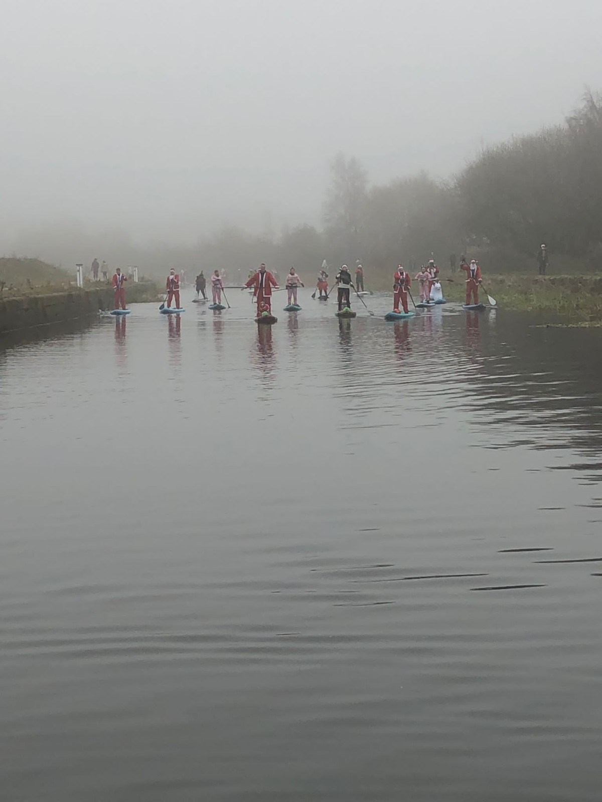 A wave of Santas. Photo: Matthew Hurding / Glasgow Paddleboard Co
