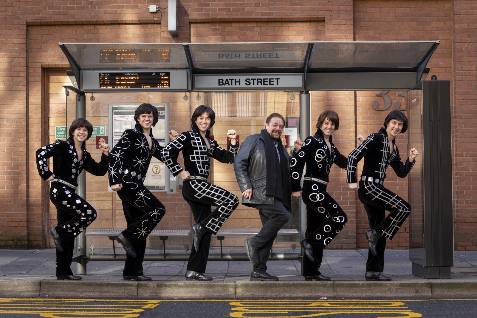 WORLD PREMIERE OF THE OSMONDS: A NEW MUSICALPicturedJay Osmond with the cast of The Osmonds : A New Musical at The King Theatre in Glasgow at the Bath Street bus stop.THE OSMONDS: A New Musical with story by Jay Osmond tells the true story of the five brothers from Utah who were pushed into the spotlight as children and went on to create smash hits, decade after decade.  From their star residency on The Andy Williams Show from 1962 to 1969, to pop stars and ‘Osmondmania’ from 1971 to 1975, to the arrival of The Donny & Marie Show, a popular variety TV show, from 1976 to 1979, The Osmonds lived a remarkable life recording chart-topping albums, selling out vast arena concerts and making record-breaking TV shows - until one bad decision cost them everything. Photograph by Martin Shields Tel 07572 457000www.martinshields.com© Martin Shields