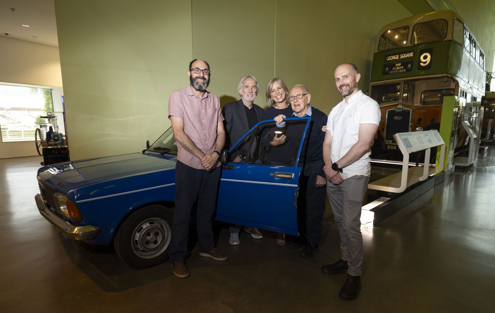 Neil Johnson-Symington Curator Glasgow Museums with Angus Dougall, Rona Dougall, Ian McGillivray and Ian Houston of Alzheimer Scotland