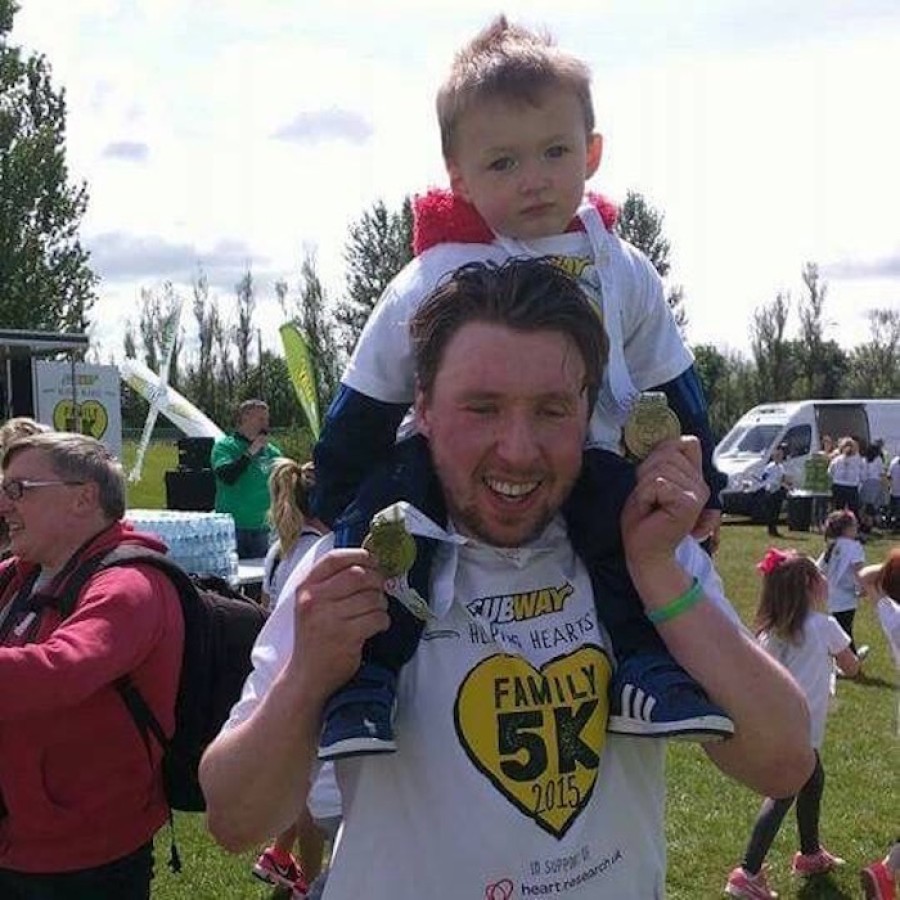  Big help: father and son at one of the many charity races. 