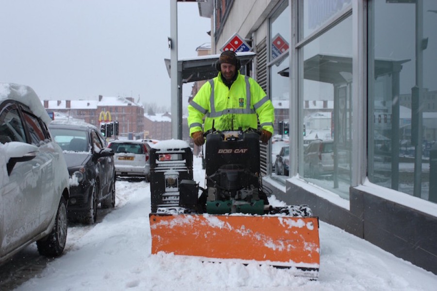  Snow zone: Council staff try to keep the pavements clear. Photo credit: Tom Hamilton 