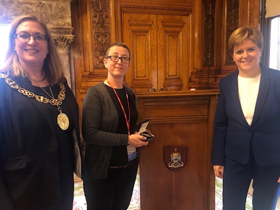  Caroline Scott (centre) with Lord Provost Eva Bolander and first minister Nicola Sturgeon