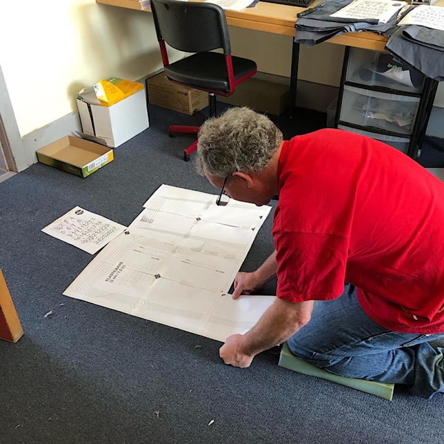  A volunteer helps to assemble templates at the Hyndland 'scrub hub'. Photo: Kay Muir