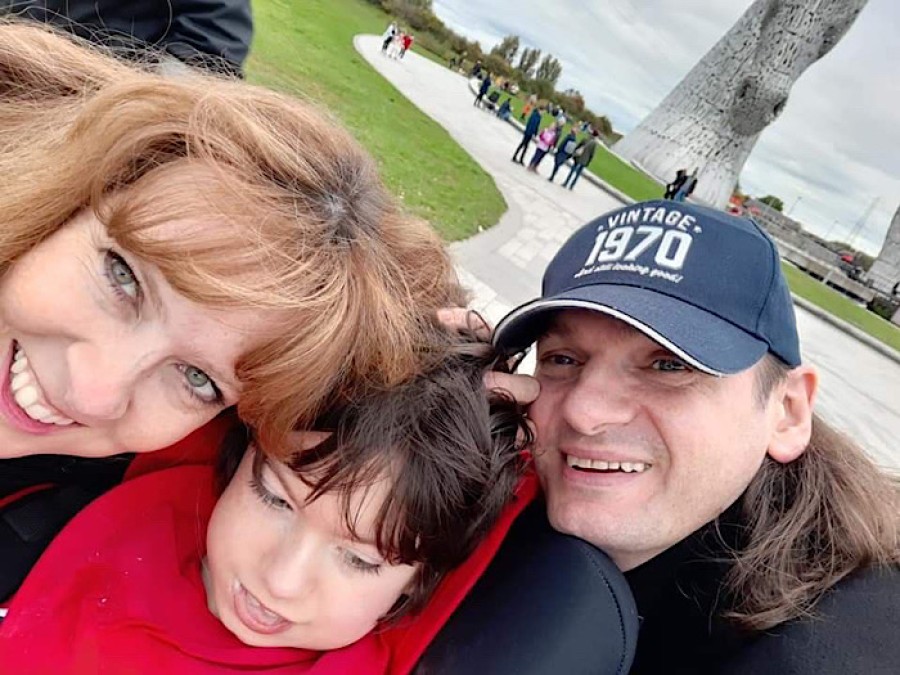 Guy with mum and dad.