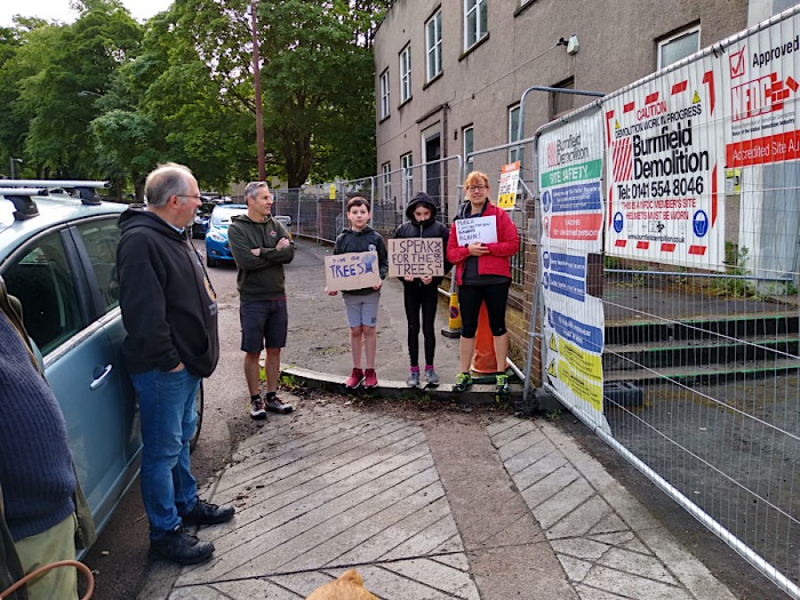  Protesters with placards at Fergus Drive on Thurday. Photo: Judith Gaertner.