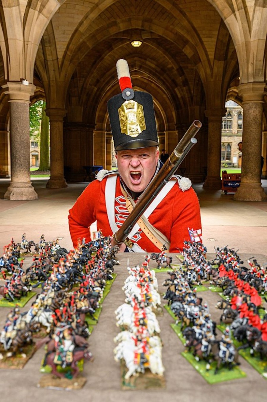  Napoleonic war re-enactor Rob Woods of the First Regiment of Foot, Royal Scots with some of the 20,000 miniature soldiers in the Great Game. Photo: John Young.