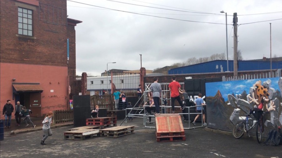  Free: An outdoor parkour space has been created in a yard next to the warehouse.