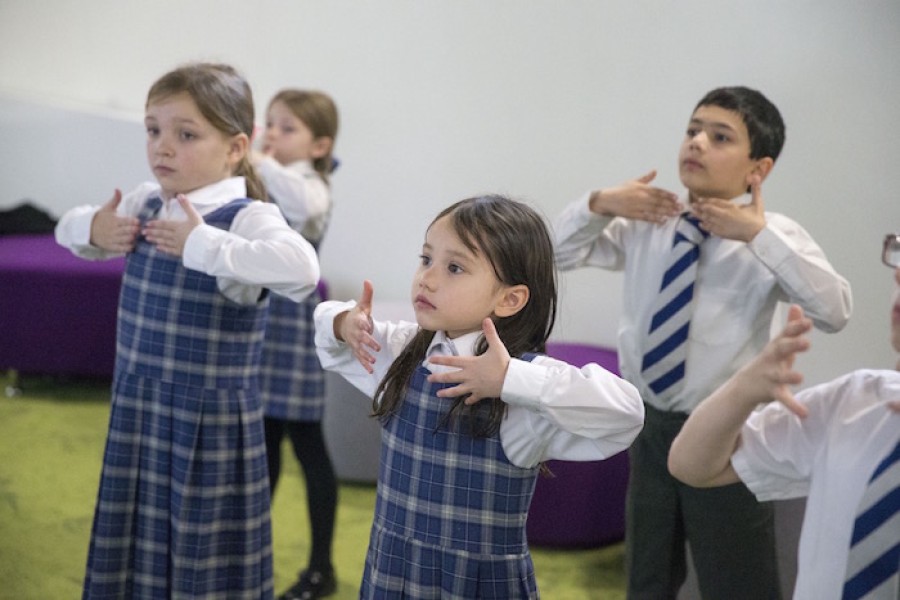  Poised: Primary 3 Kelvinside Academy pupils try out ‘Mindful Movements’, gentle exercises based on Yoga, Qigong and Tai Chi incorporating breathing and meditation.