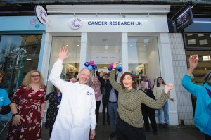 Dr Seth Coffelt and Lori Delaney open the new Cancer Research UK Store in Byres Road.